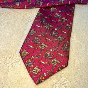 Salvatore Ferragamo silk necktie. Red jungle pattern with tigers. 3.5” wide.